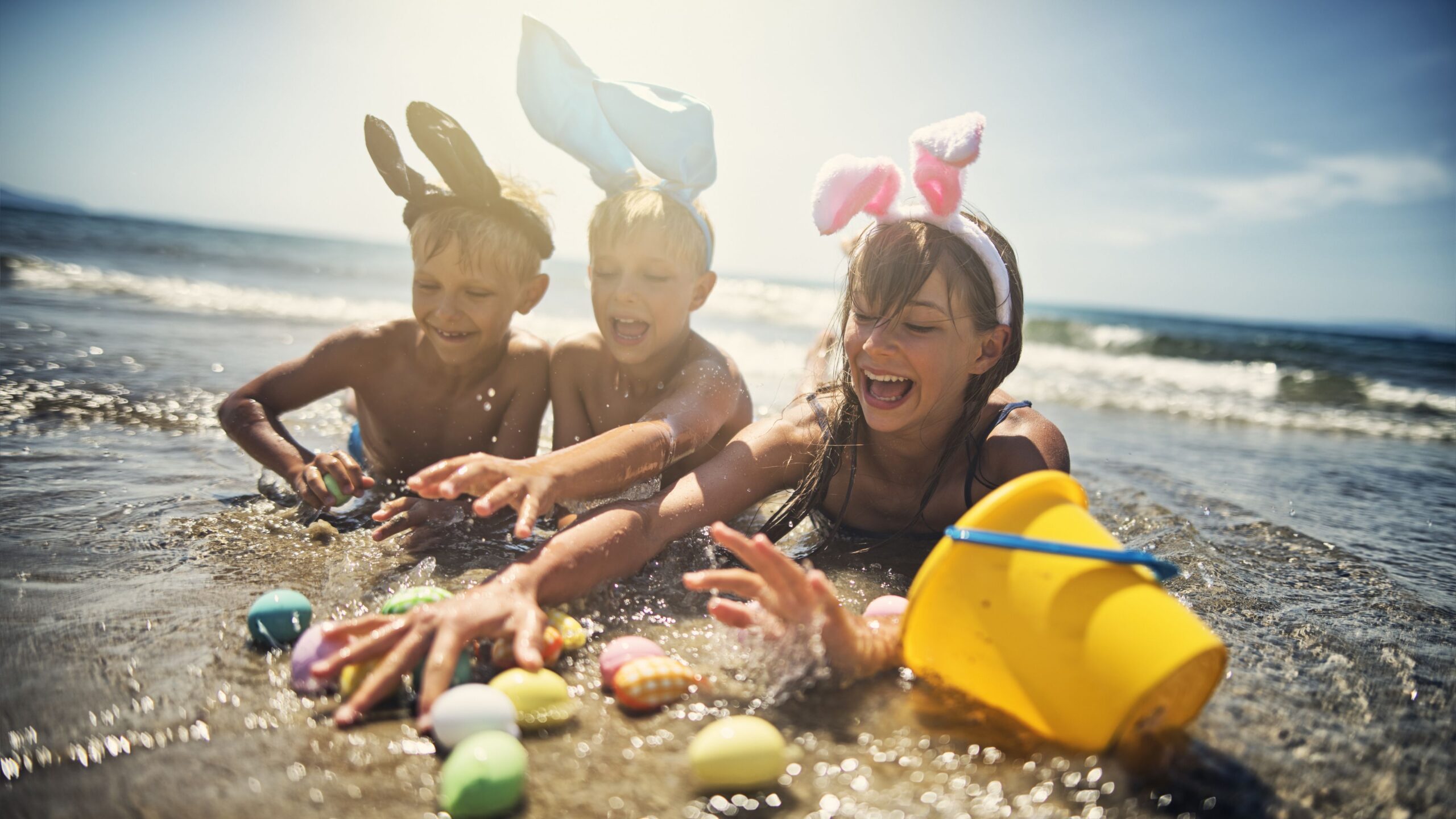 Kids playing in sea during summer easter 901432582 5c14485f46e0fb00014be1ff scaled