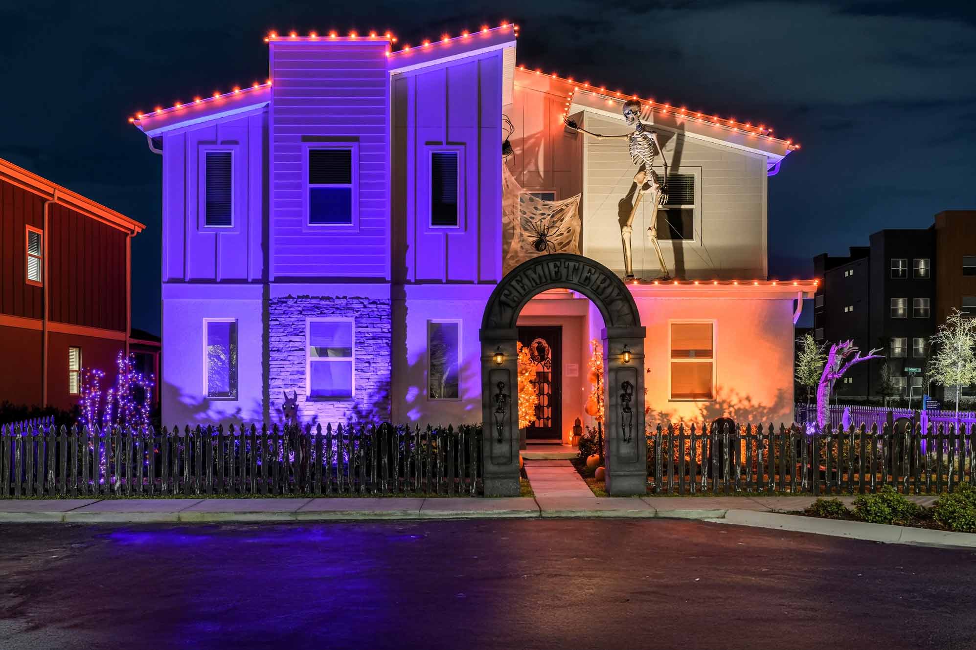 front of a villa decorated for halloween