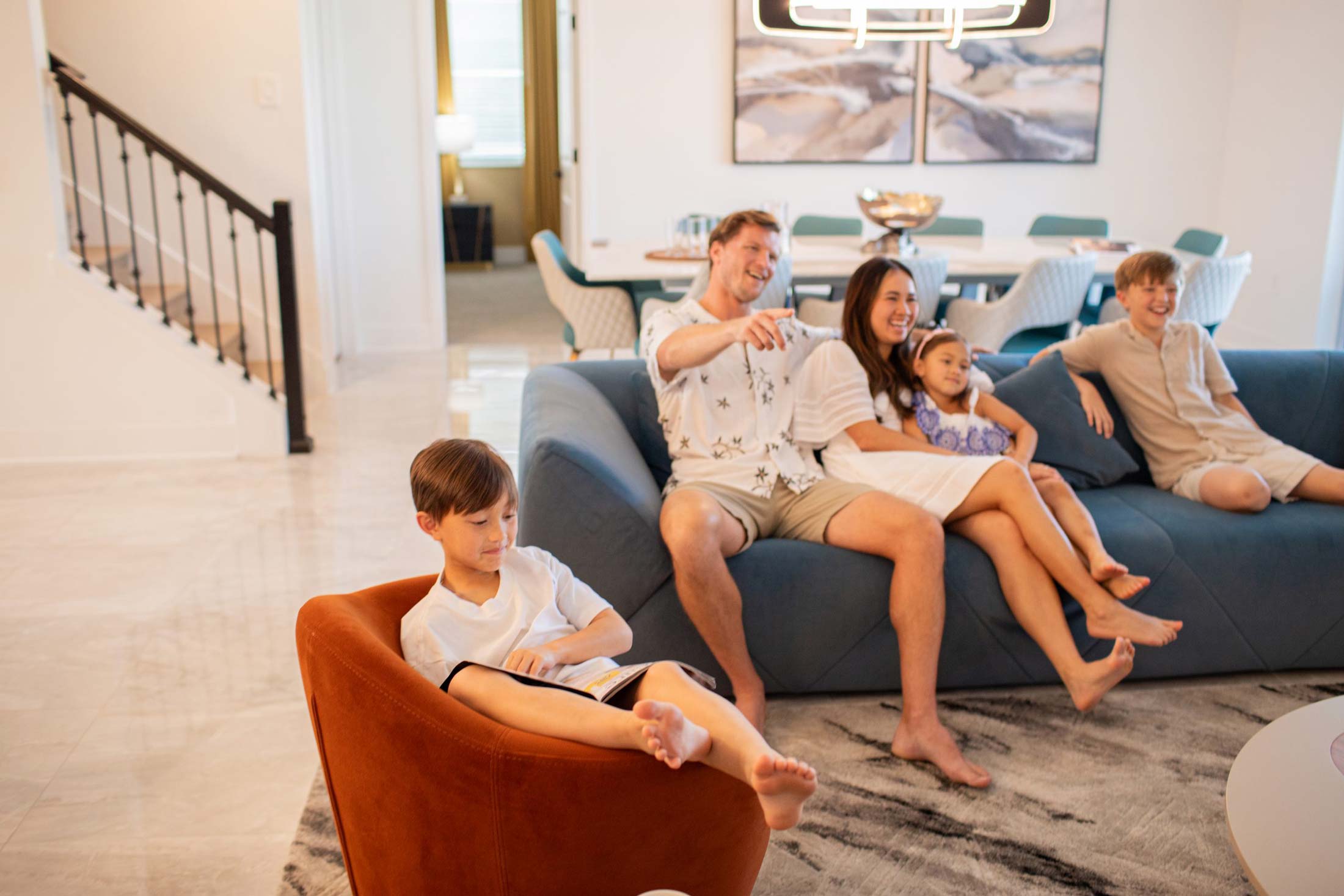 family sitting in a living room