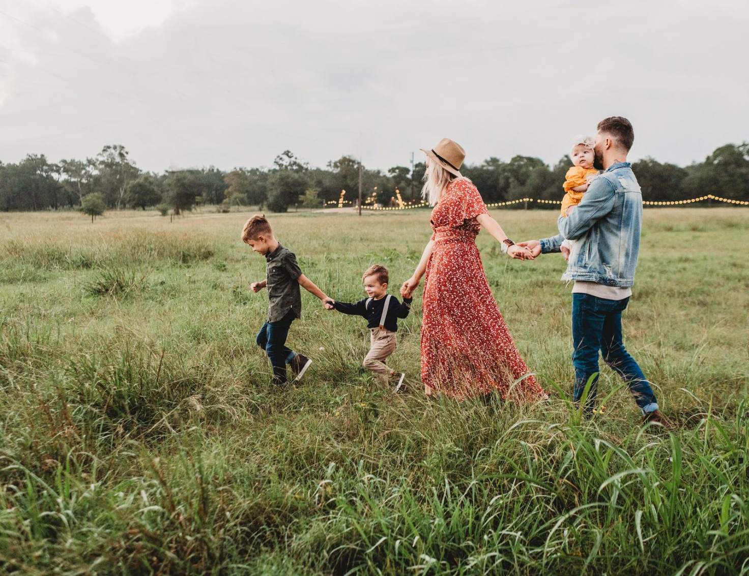 family walking in a field