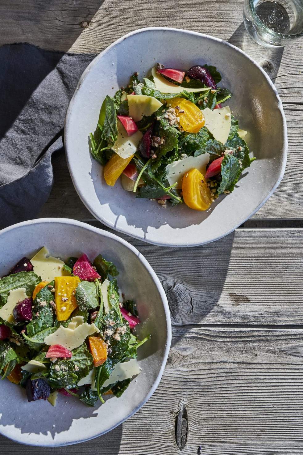 2 plates with salad