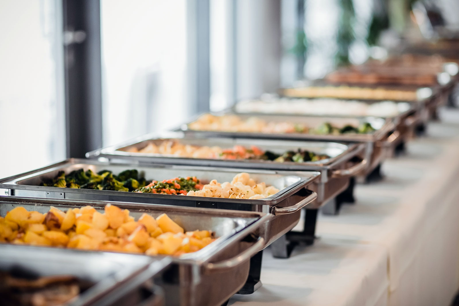 trays of food in a buffet